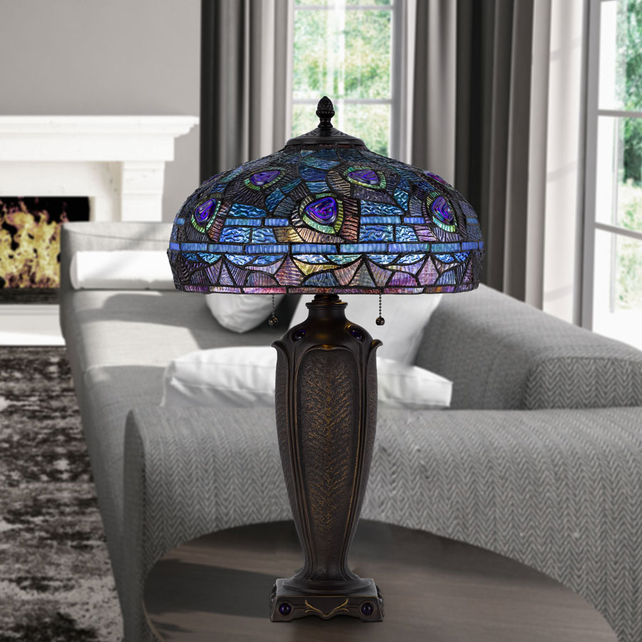 Tiffany stained glass lamp on a wooden side table