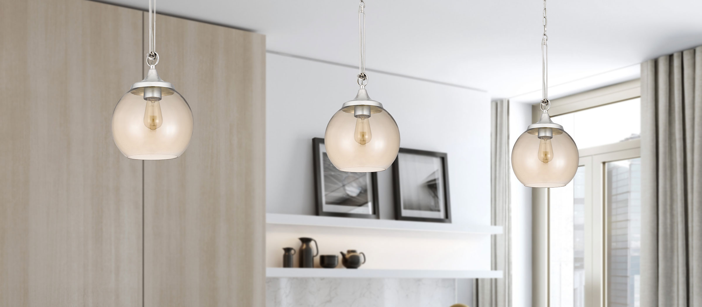 Pendant lights suspended above a kitchen island